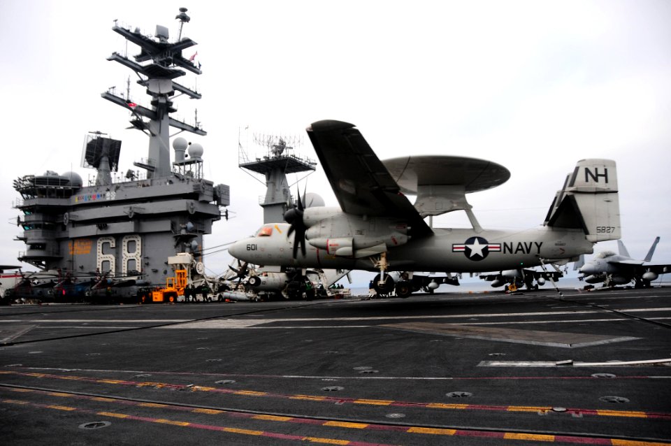 US Navy 090601-N-3946H-190 An E-2C Hawkeye assigned to the Wallbangers of Early Warning Attack Squadron (VAW) 117 makes an arrested landing aboard the aircraft carrier USS Nimitz (CVN 68)