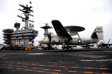 US Navy 090601-N-3946H-190 An E-2C Hawkeye assigned to the Wallbangers of Early Warning Attack Squadron (VAW) 117 makes an arrested landing aboard the aircraft carrier USS Nimitz (CVN 68)