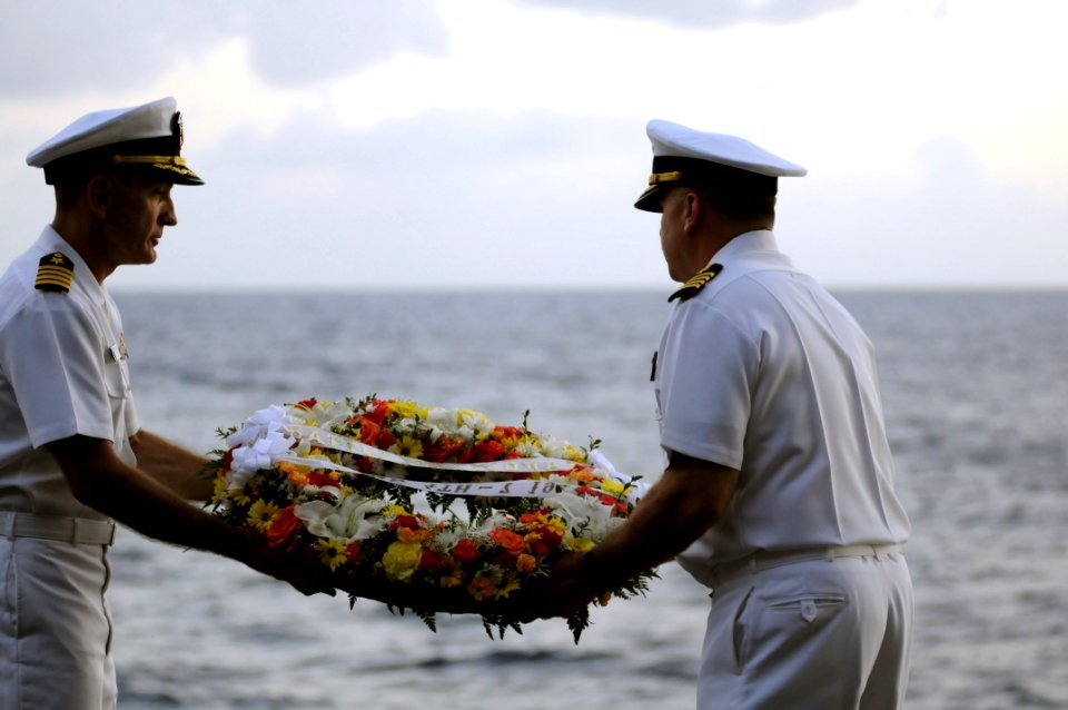 US Navy 090605-N-2344B-208 Capt. Thomas P. Lalor, commander, Carrier Air Wing 14, and Capt. K.J. Norton, commanding officer of the USS Ronald Reagan (CVN 76), prepare to throw