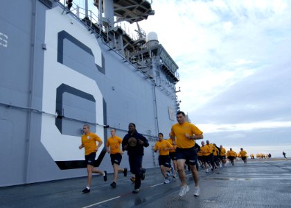 US Navy 090605-N-0515W-059 Sailors assigned to the amphibious assault ship USS Bonhomme Richard (LHD 6) participate in command physical training