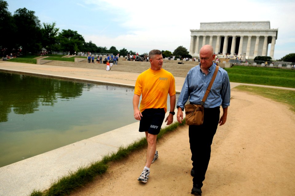 US Navy 090602-N-9818V-192 Master Chief Petty Officer of the Navy (MCPON) Rick West speaks with Navy Times reporter Mark Faram during a walking meeting along the National Mall