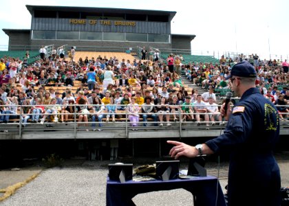 US Navy 090602-N-5366K-002 Lt. Cmdr. Robert Kaminski (SEAL), assigned to the U.S. Navy Parachute Team, the Leap Frogs, speaks to students about Naval Special Warfare before a parachute demonstration by the Leap Frogs at Brooke photo