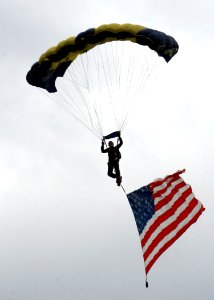 US Navy 090530-N-5366K-036 Chief Special Warfare Operator (SEAL) William Davis, assigned to the U.S. Navy Parachute Team, the Leap Frogs, makes his final approach to land at Southern Wisconsin AirFest 2009