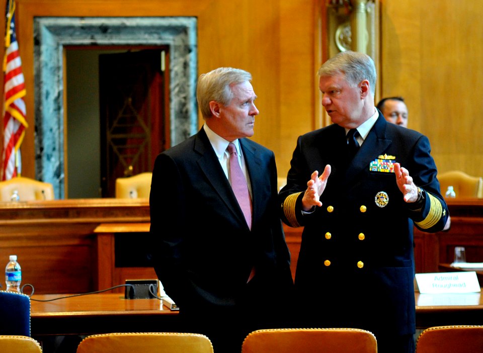 US Navy 090602-N-8273J-010 Chief of Naval Operations (CNO) Adm. Gary Roughead speaks with Secretary of the Navy (SECNAV) the Honorable Ray Mabus prior to appearing before the Senate Appropriations Committee for Defense