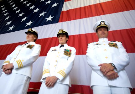 US Navy 090606-N-7090S-147 Cmdr. Catherine M. Jendrysik, left, Cmdr. Karin A. Kulinski and Capt. Richard S. Tedmon bow their heads in prayer during a change of command ceremony
