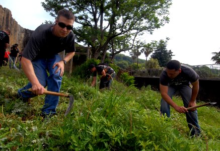 US Navy 090604-N-0807W-021 Sailors assigned to Fleet Activities Sasebo clean weeds and debris during a community service project at Ishidake Zoo