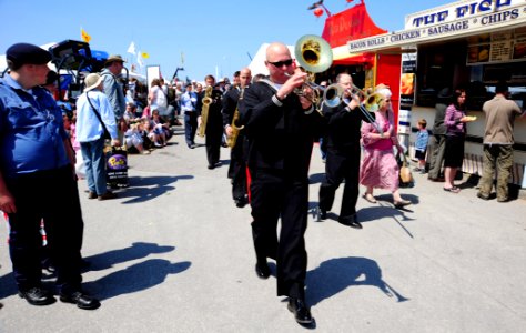 US Navy 090604-N-7526R-045 Musician 1st Class Justin Benge leads a five-member brass ensemble from the U.S. Naval Forces Europe and Africa Band through the Royal Cornwall show ground