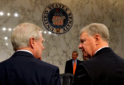US Navy 090604-N-8273J-014 Secretary of the Navy (SECNAV) the Honorable Ray Mabus and Chief of Naval Operations (CNO) Adm. Gary Roughead speak prior to appearing before the Senate Armed Services Committee photo