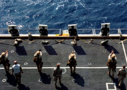 US Navy 090603-N-6720T-122 Marines from Fleet Anti-Terrorism Security Team Pacific (FASTPAC) participate in a live-fire exercise aboard the aircraft carrier USS George Washington (CVN 73)