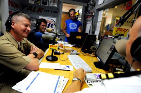 US Navy 090609-N-9818V-027 Master Chief Petty Officer of the Navy (MCPON) Rick West, left, and Lt. Ron Carpinella are interviewed about Chattanooga Navy Week events