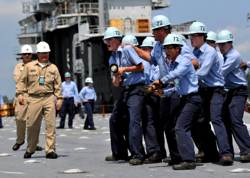 US Navy 090611-N-1229B-051 Sailors of the USS Abraham Lincoln (CVN 72) take part in a simulated flight deck fire drill aboard the decommissioned aircraft carrier Ranger (CV 61)