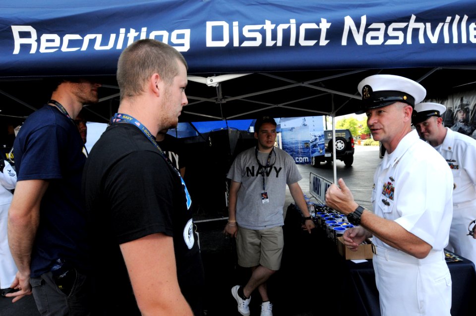 US Navy 090609-N-9818V-346 Master Chief Petty Officer of the Navy (MCPON) Rick West speaks with members in the Navy Delayed Entry Program (DEP) at the Riverbend Festival