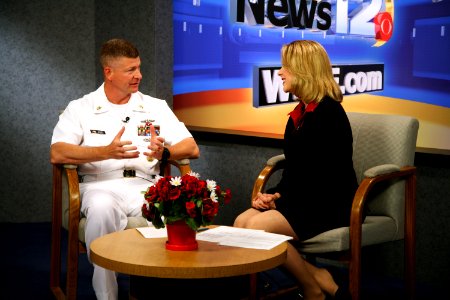 US Navy 090610-N-3271W-008 Master Chief Petty Officer of the Navy (MCPON) Rick West is interviewed by Rachel Oesch on the morning show at WDEF (CBS-12)