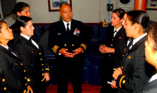 US Navy 090611-N-4879G-256 Commander of Destroyer Squadron (DESRON) 40 Capt. Rodelio Laco speaks to female Peruvian naval officers in the wardroom of the guided missile frigate USS Doyle (FFG 39)