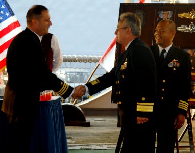 US Navy 090611-N-4879G-093 Commanding officer of the guided missile frigate USS Doyle (FFG 39) Cmdr. John Zuzich greets Vicealmirante Carlos Chanduvi Salazar of the Peruvian navy