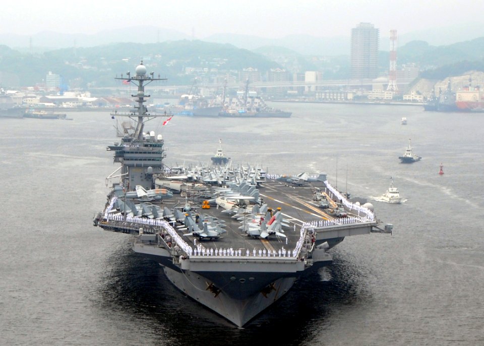 US Navy 090610-N-9565D-033 Sailors man the rails aboard the aircraft carrier USS George Washington (CVN 73) during the ship's departure from Fleet Activities Yokosuka