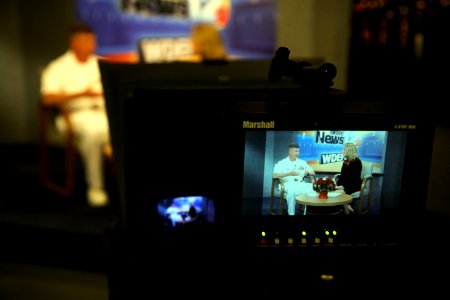 US Navy 090610-N-3271W-014 Master Chief Petty Officer of the Navy (MCPON) Rick West is interviewed by Rachel Oesch on the morning show of WDEF (CBS-12)