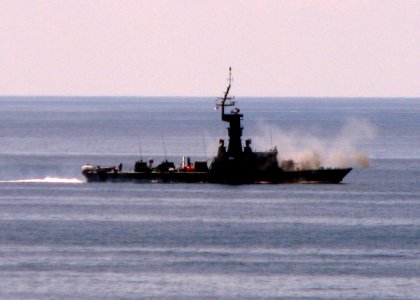 US Navy 090613-N-7058E-032 The Republic of Singapore Navy corvette RSS Victory (P 88) fires its 76mm gun at a surface target during a Cooperation Afloat Readiness and Training (CARAT) 2009 gunnery exercise