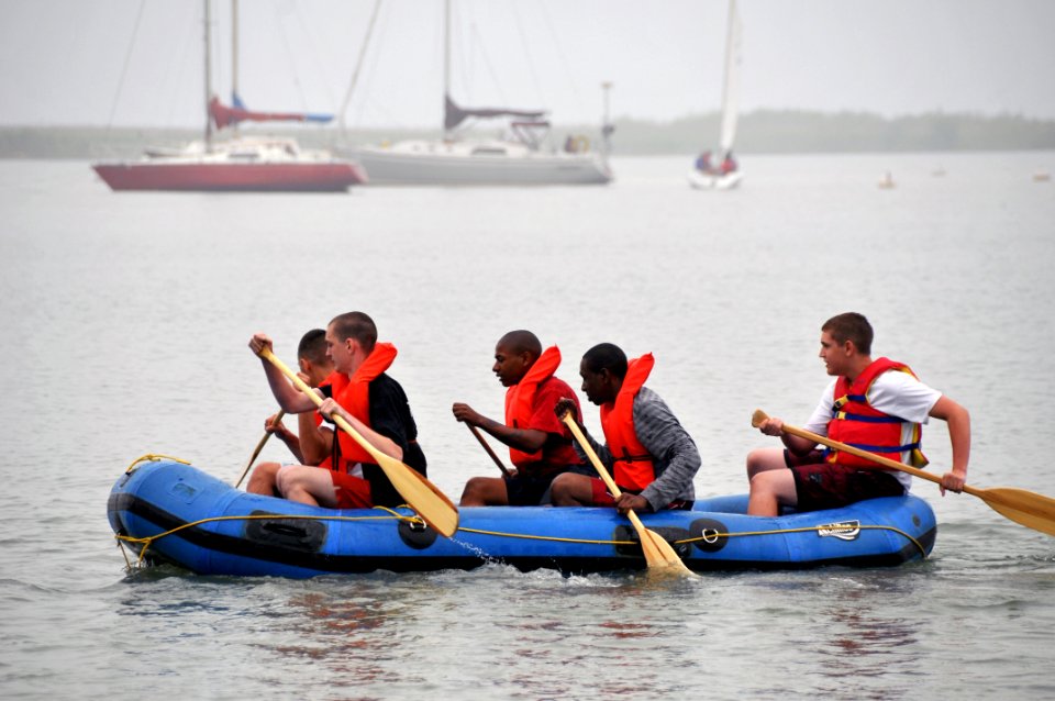 US Navy 090617-N-8848T-857 Navy Junior ROTC cadets paddle a rubber raft on Lake Michigan at the Naval Stations Great Lakes Marina