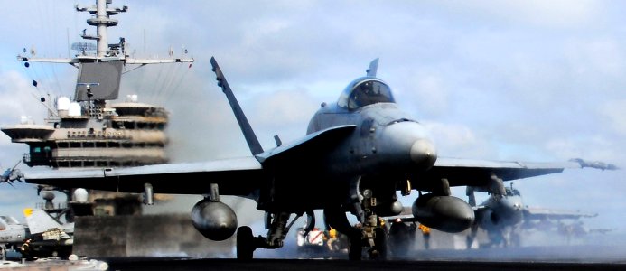 US Navy 090616-N-6538W-135 An F-A-18C Hornet from the Death Rattlers of Marine Strike Fighter Squadron (VMFA) 323 launches from the aircraft carrier USS John C. Stennis (CVN 74) during exercise Northern Edge 2009
