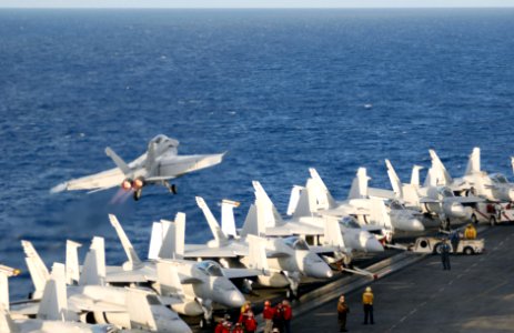 US Navy 090615-N-9132C-122 An F-A-18F Super Hornet assigned to the Fighting Redcocks of Strike Fighter Squadron (VFA) 22 launches from the aircraft carrier USS Ronald Reagan (CVN 76)