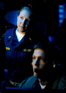 US Navy 090619-N-5345W-111 Ensign Amee Johnson monitors the movements of simulated hostile contacts with Lt.j.g. Ethan Blankenship