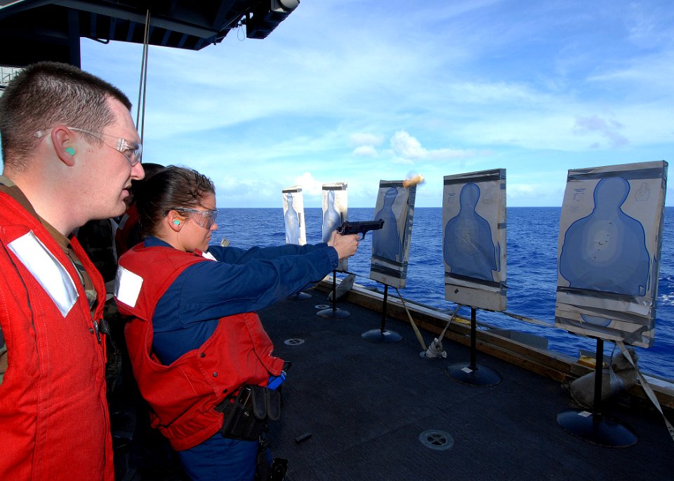 US Navy 090619-N-6720T-075 Aviation Ordnanceman Airman Christina Kirchhofer participates in a small-arms firing exercise