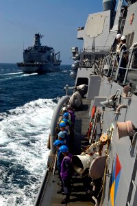 US Navy 090619-N-9123L-016 Sailors aboard the guided-missile destroyer USS McCampbell (DDG 85) stand by as the ship approaches the Military Sealift Command fleet replenishment oiler USNS Rappahannock (T-AO 204)