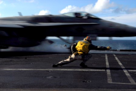 US Navy 090622-N-7780S-035 Lt. Jim Imlah, from Newport, Ore., launches an F-A-18C Hornet, from the Death Rattlers of Marine Strike Fighter Squadron (VMFA) 323, from the aircraft carrier USS John C. Stennis (CVN 74)