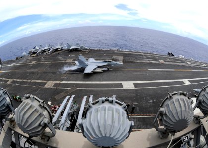 US Navy 090620-N-1062H-052 An F-A-18F Super Hornet from the Diamondbacks of Strike Fighter Squadron (VFA) 102 lands aboard the aircraft carrier USS George Washington (CVN 73)