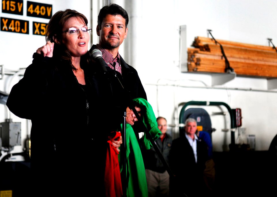 US Navy 090622-N-9928E-123 Alaska Gov. Sarah Palin, left, and her husband, Todd Palin, address the crew of the aircraft carrier USS John C. Stennis (CVN 74)