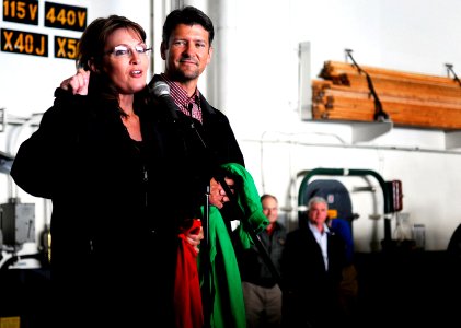 US Navy 090622-N-9928E-123 Alaska Gov. Sarah Palin, left, and her husband, Todd Palin, address the crew of the aircraft carrier USS John C. Stennis (CVN 74)