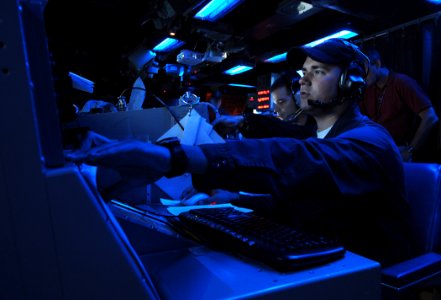 US Navy 090618-N-3666S-022 Lt. Dan Supple participates in a Fleet Synthetic Training (FST) exercise aboard the guided-missile cruiser USS Chosin (CG 65)