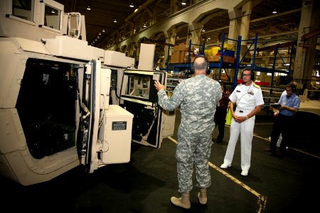 US Navy 090623-N-3271W-023 Rear Adm. Michael J. Browne, deputy chief engineer of Naval Sea Systems Command, tours the Rock Island Arsenal with Col. Craig Cotter, commanding officer of the Joint Manufacturing Technology Center