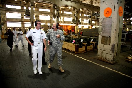 US Navy 090623-N-3271W-030 Rear Adm. Michael J. Browne, deputy chief engineer of Naval Sea Systems Command, tours the Rock Island Arsenal with Col. Craig Cotter, Commanding Officer, Joint Manufacturing Technology Center