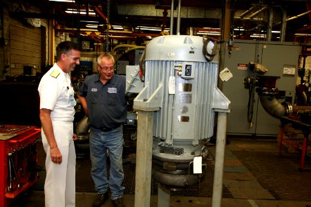 US Navy 090622-N-3271W-030 Rear Adm. Michael J. Browne, deputy chief engineer of Naval Sea Systems Command, tours Carver Pump, a facility that builds pumps for the Navy