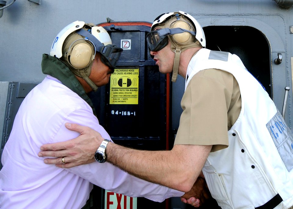 US Navy 090621-N-1062H-019 Republic of Palau President Johnson Toribiong is greeted by Capt. David A. Lausman, commanding officer of the aircraft carrier USS George Washington (CVN 73)