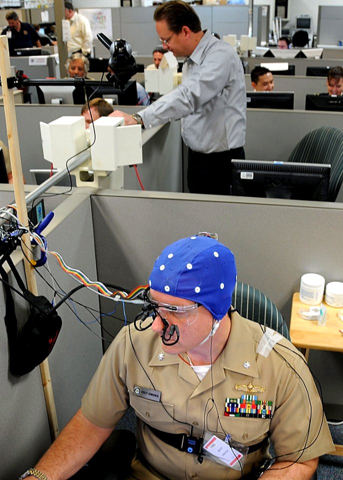 US Navy 090624-N-9900B-014 Cmdr. Robert Nowakowski, assigned to Naval Cooperation and Guidance for Shipping, participates in an experiment tracking his physiological responses during Trident Warrior 09