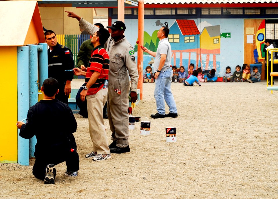 US Navy 090622-N-7092S-389 ailors from the U.S., Chile, Brazil and United Kingdom renovate the Jardin Infantil Jesus de Puaga day care center during a Southern Seas 2009 community service project