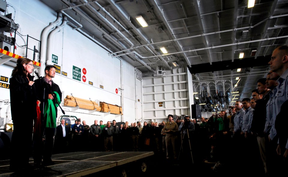 US Navy 090622-N-9928E-138 Alaska Gov. Sarah Palin and husband Todd Palin greet the crew of the aircraft carrier USS John C. Stennis (CVN 74) during an informal address in hangar bay two