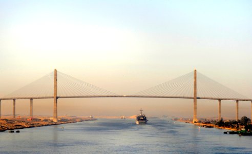 US Navy 090622-N-5345W-005 USS Ponce (LPD 15) crosses under the Egyptian-Japanese Friendship Bridge in El Qantara, Egypt, while transiting the Suez Canal