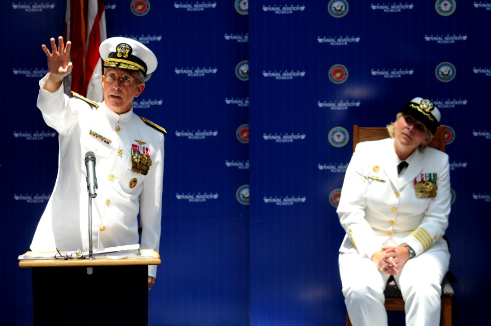 US Navy 090626-N-5328N-255 Capt. Connie Frizzell, right, listens to remarks by Rear Adm. Gary Jones, commander, Naval Education and Training Command, during the Center for Information Dominance (CID) Corry Station change of com