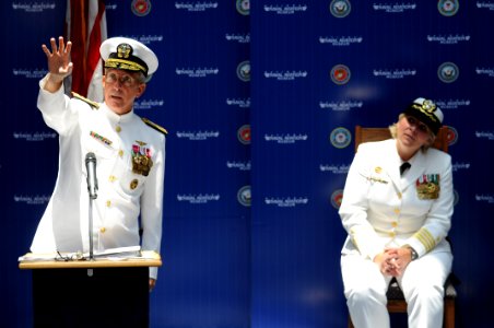 US Navy 090626-N-5328N-255 Capt. Connie Frizzell, right, listens to remarks by Rear Adm. Gary Jones, commander, Naval Education and Training Command, during the Center for Information Dominance (CID) Corry Station change of com