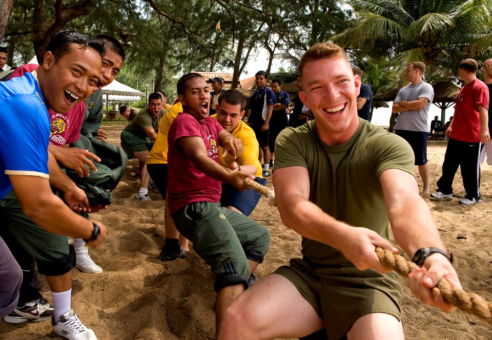US Navy 090625-N-1722M-300 Lance Cpl. Andrew Zagrocki, front, assigned to the 4th Assault Amphibian Battalion, and Malaysian Army Pvt. Amd Azrol, pull their way to victory in a tug-of-war