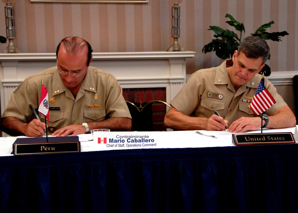 US Navy 090624-N-2821G-002 Peruvian Navy Rear Adm. Mario Luis Caballero Ferioli and Capt. Wayne Harrison sign a memorandum of understanding