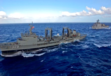 US Navy 090711-N-9950J-002 The Australian underway replenishment tanker HMAS Success (OR 304) and the dock landing ship USS Tortuga (LSD 46) pull alongside the forward-deployed amphibious assault ship USS Essex during an underw