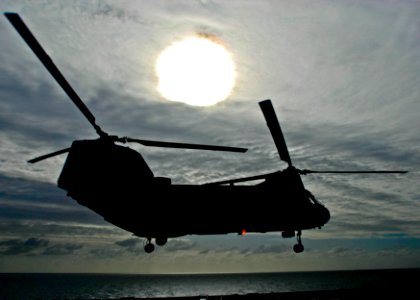 US Navy 090709-N-9950J-033 A CH-46E Sea Knight helicopter lifts off from the flight deck of the amphibious assault ship USS Essex (LHD 2)