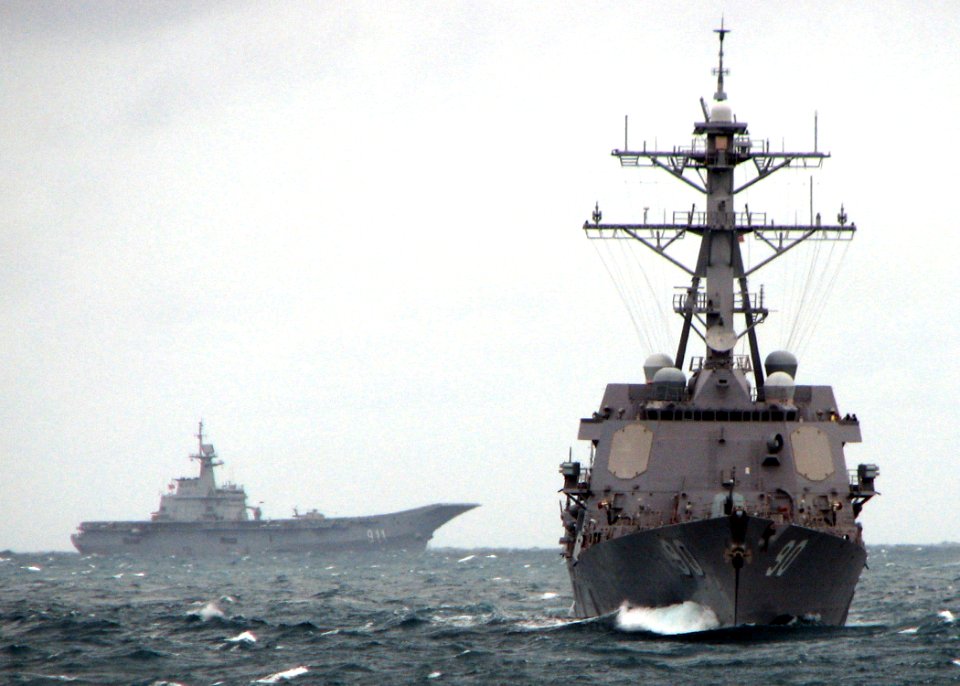 US Navy 090713-N-7058E-068 The guided-missile destroyer USS Chafee (DDG 90) leads the Royal Thai Navy aircraft carrier HTMS Chakri Naruebet (CVH 911) during the at-sea phase of Cooperation Afloat Readiness and Training (CARAT)