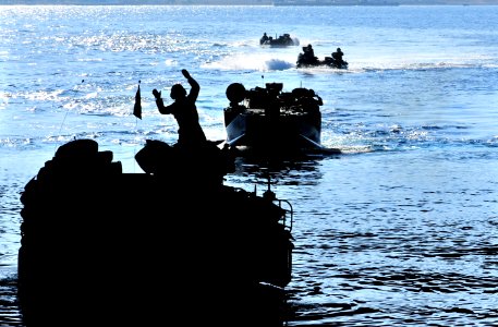 US Navy 090711-N-9740S-444 Amphibious assault vehicles from the 22nd Marine Expeditionary Unit (22nd MEU) approach the well deck of the amphibious assault ship USS Bataan (LHD 5) during an amphibious training exercise photo