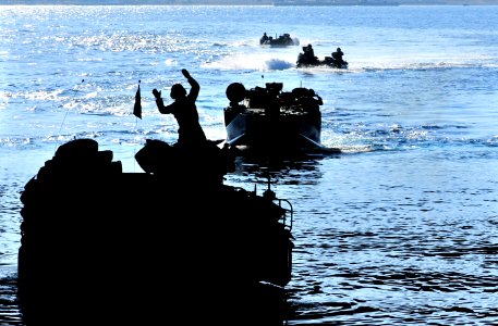 US Navy 090711-N-9740S-444 Amphibious assault vehicles from the 22nd Marine Expeditionary Unit (22nd MEU) approach the well deck of the amphibious assault ship USS Bataan (LHD 5) during an amphibious training exercise